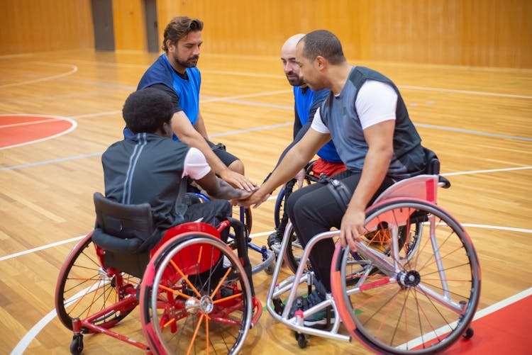 Men On Wheelchairs At Sports Hall