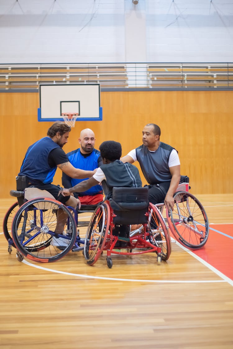 Men On Wheelchairs At Sports Hall