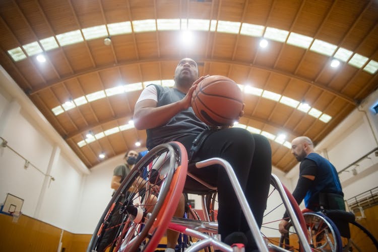 Man Holding A Basketball