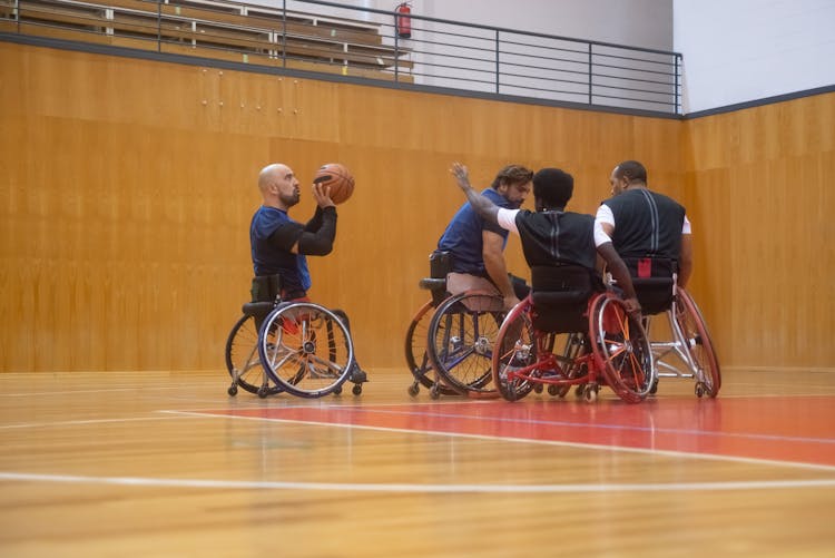 Men Playing Basketball