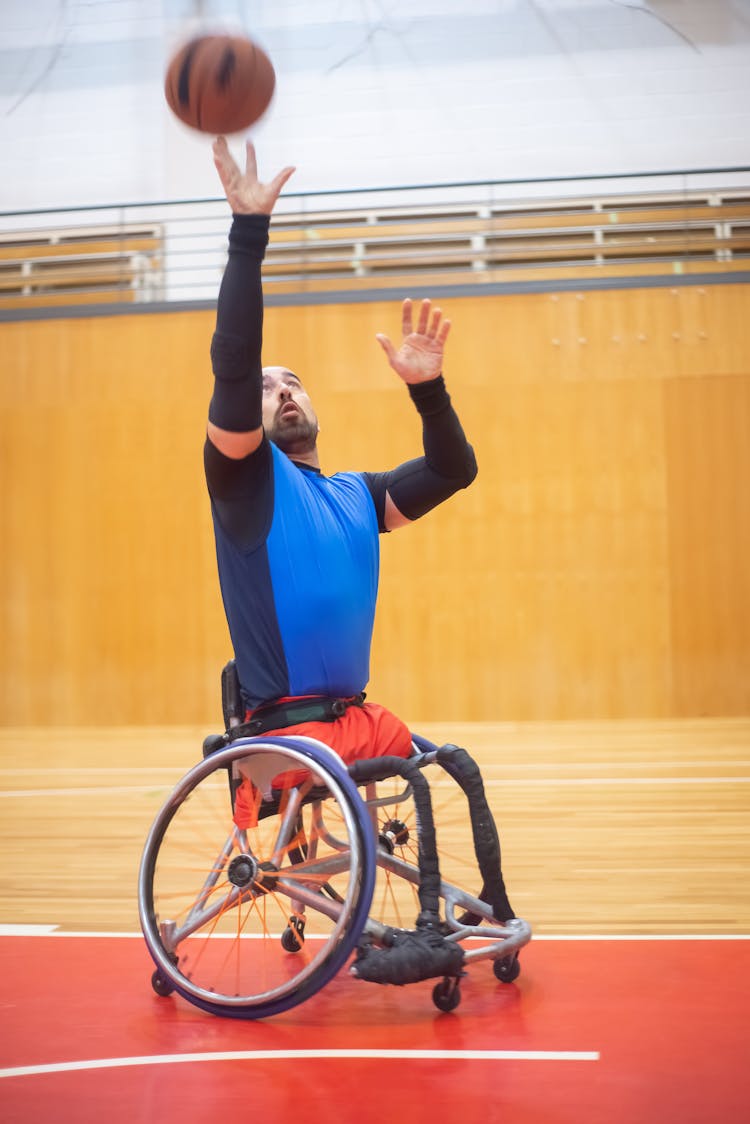 A Man Playing Basketball