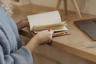 Person Browsing a Notebook