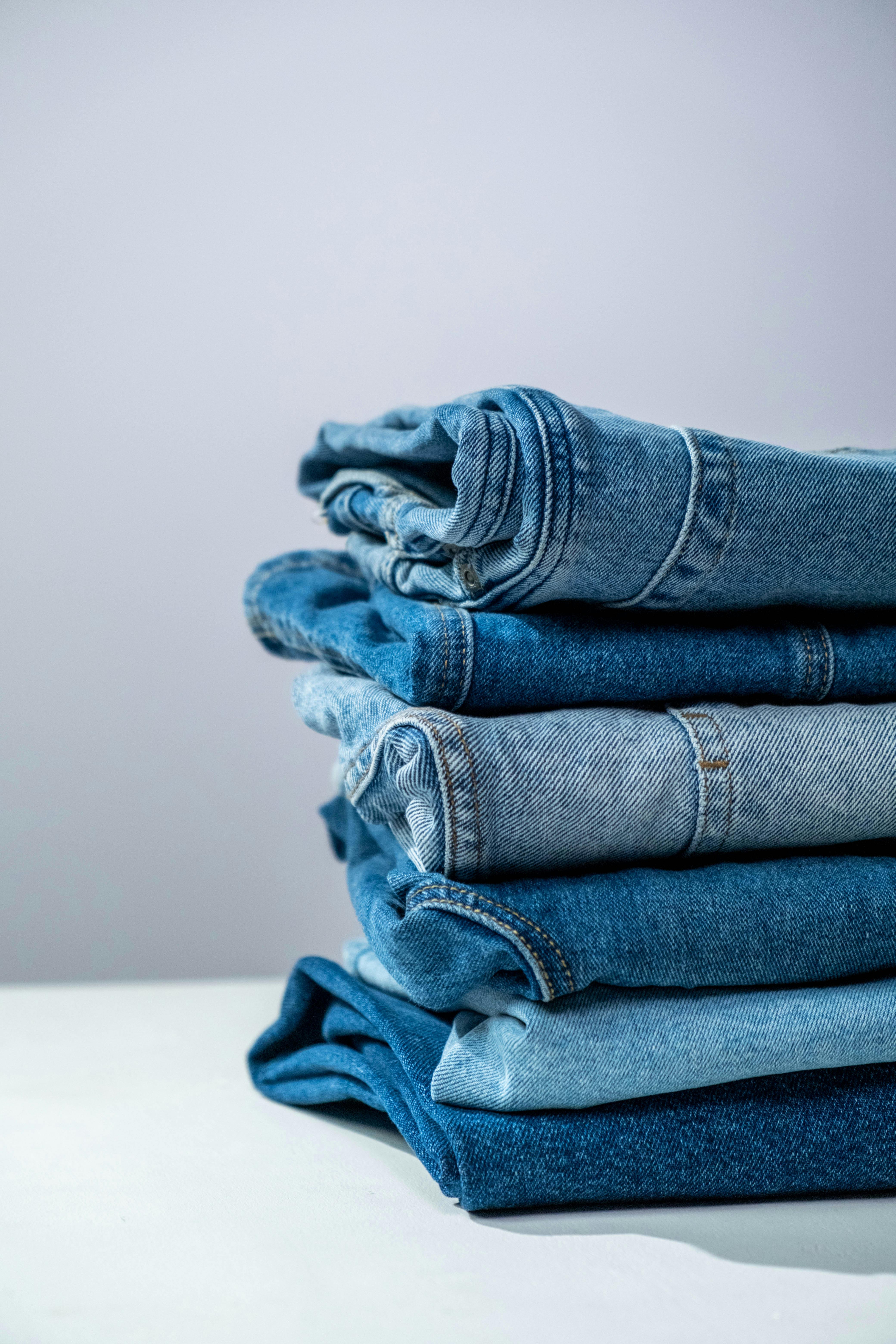 Pile of Denim Blue Jeans · Free Stock Photo