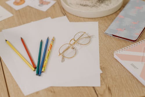 Fotos de stock gratuitas de cuaderno, de cerca, gafas