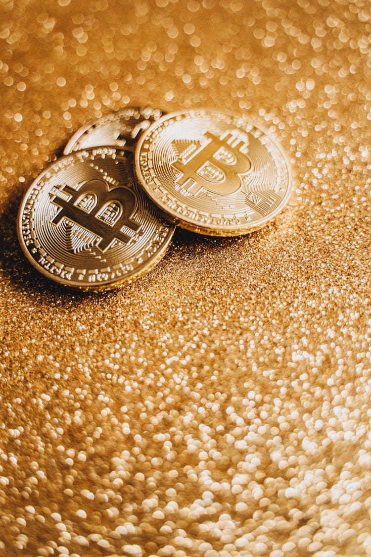 Digital Currency Coins On Gold Surface