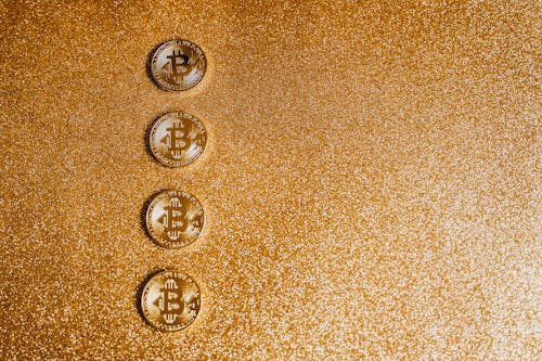 Close-up Photo of Gold Coins