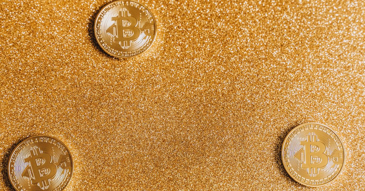 Round Coin Gold Round Coins with a Glittery Background · Free Stock Photo