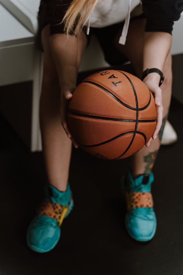 Close-Up Shot Of A Person Holding A Ball