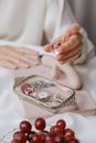 Person Holding Silver and White Tray