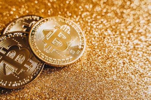 Gratis lagerfoto af bitcoins, guld, guld glitter baggrund