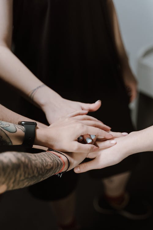 Group of People with Hands Together