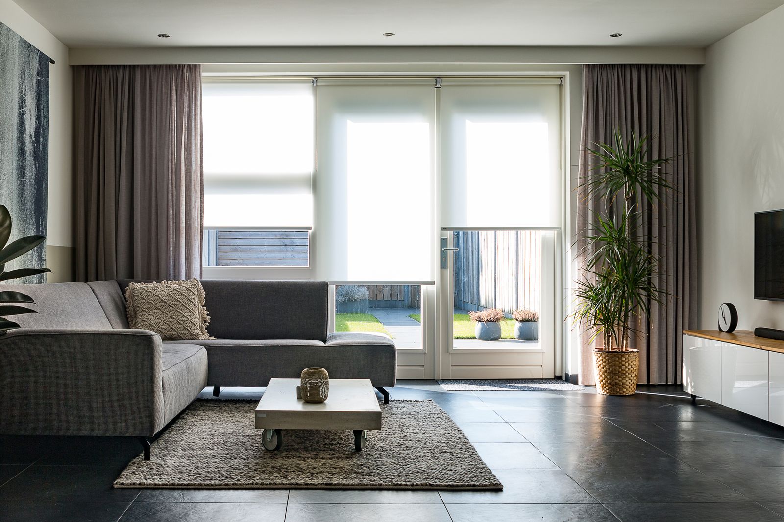 Modern home interior with comfortable living room furniture