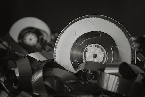 Black and White Photo of Cassette Tape and Recorder