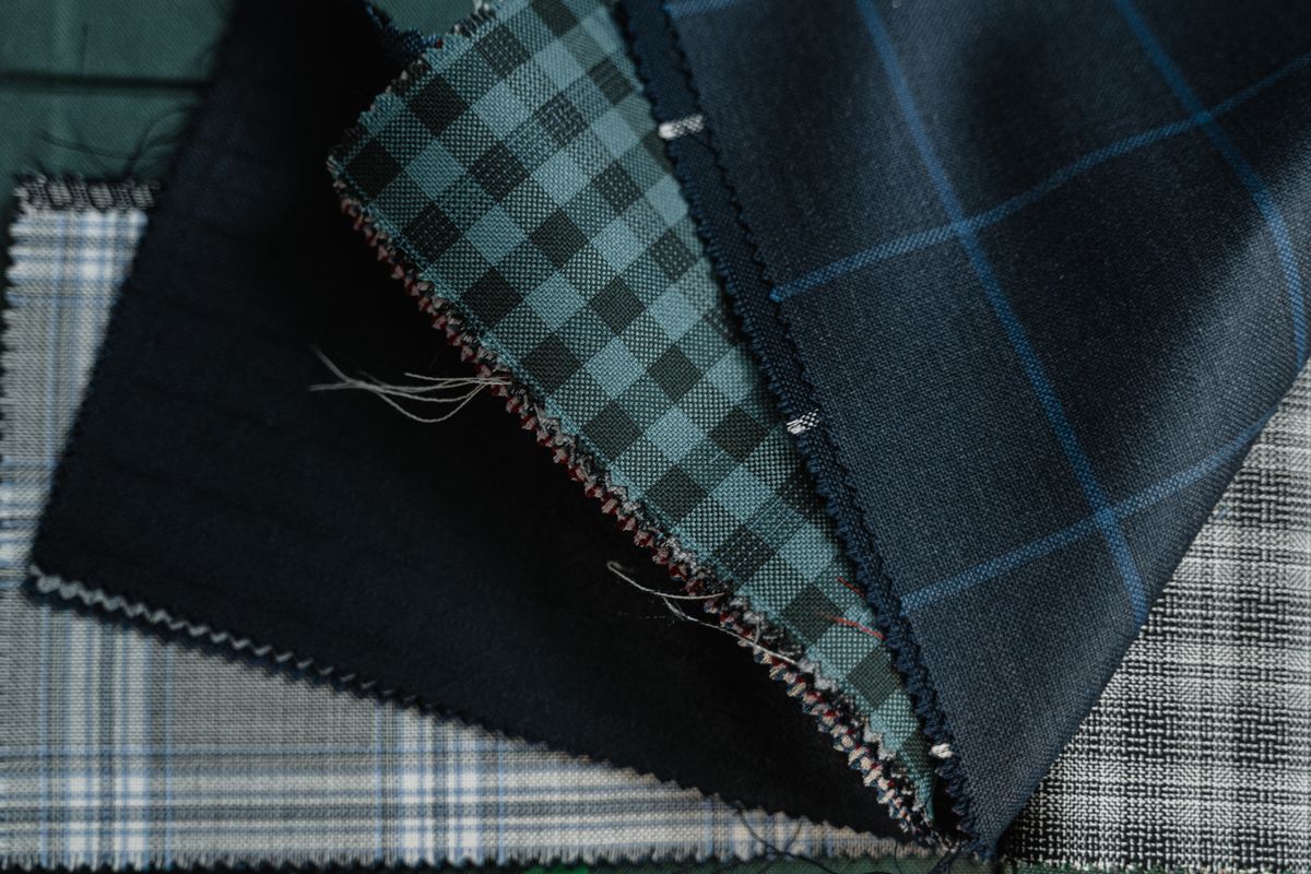 Fabric swatches laid out for compliance review
