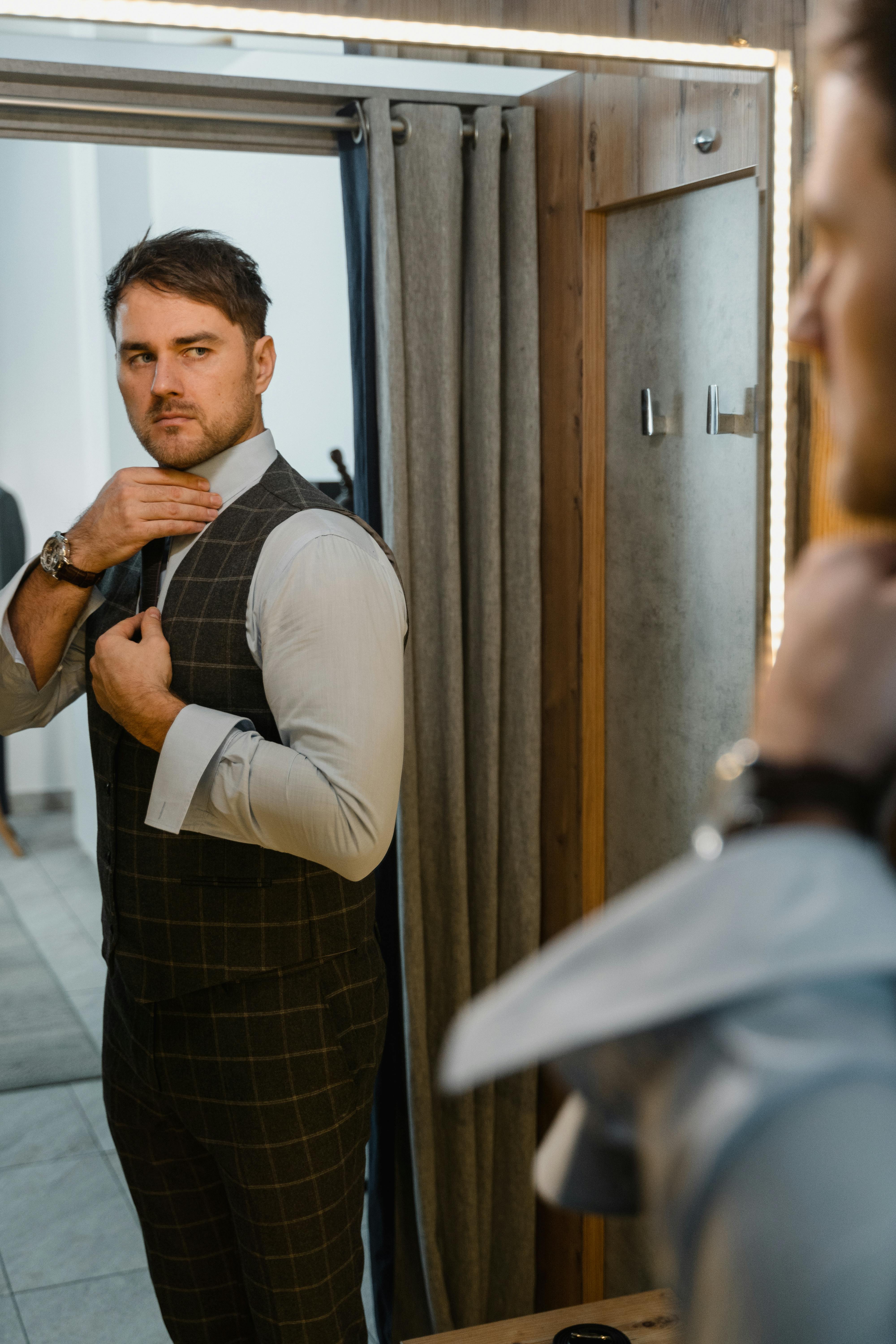 man in white dress shirt and black necktie