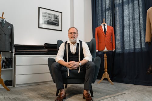 A Tailor Sitting in an Armchair