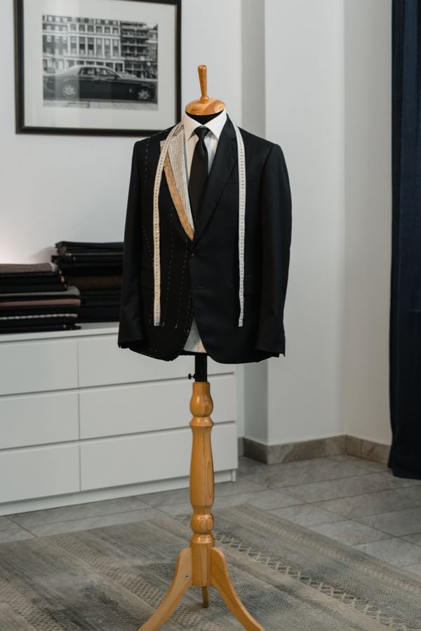 Finished jacket displayed on a tailor's dummy