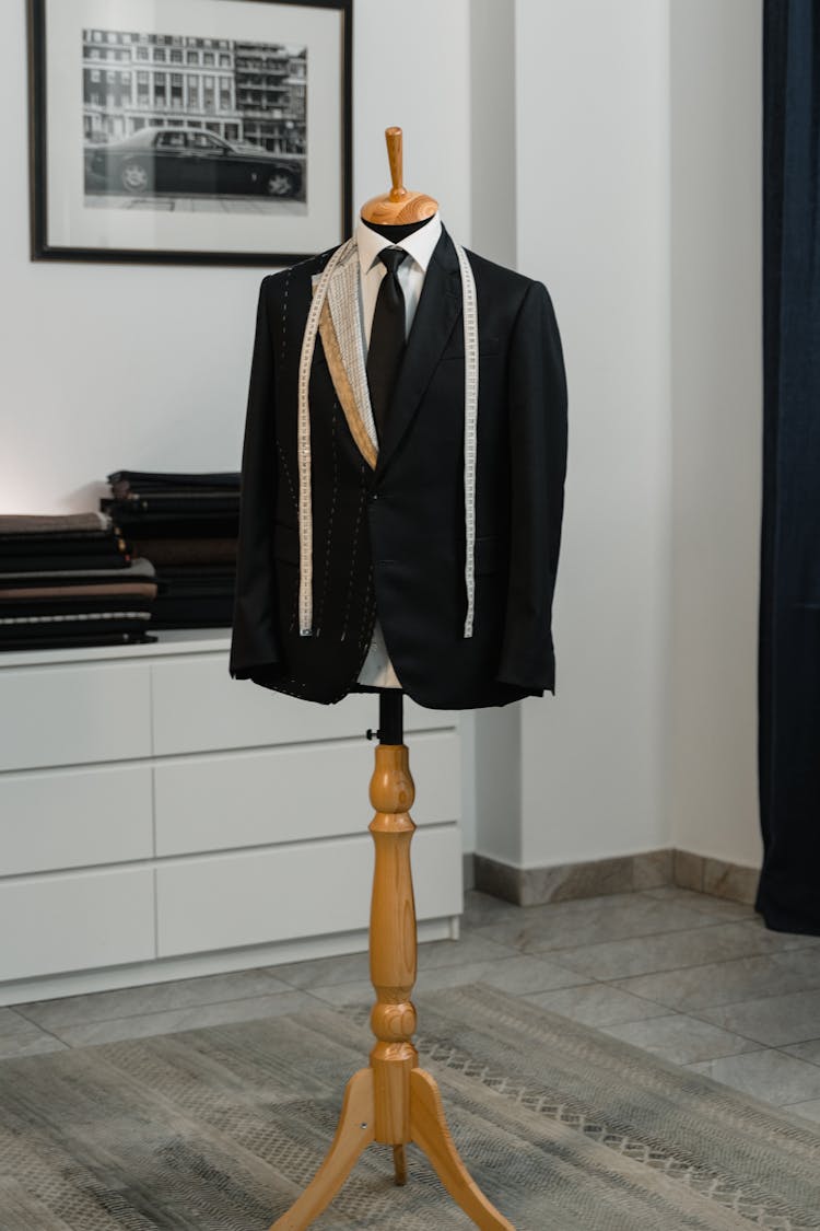 A Bespoke Suit Jacket On A Tailor Dummy