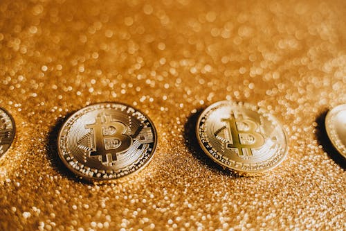 Shiny Bitcoins with Glittery Background