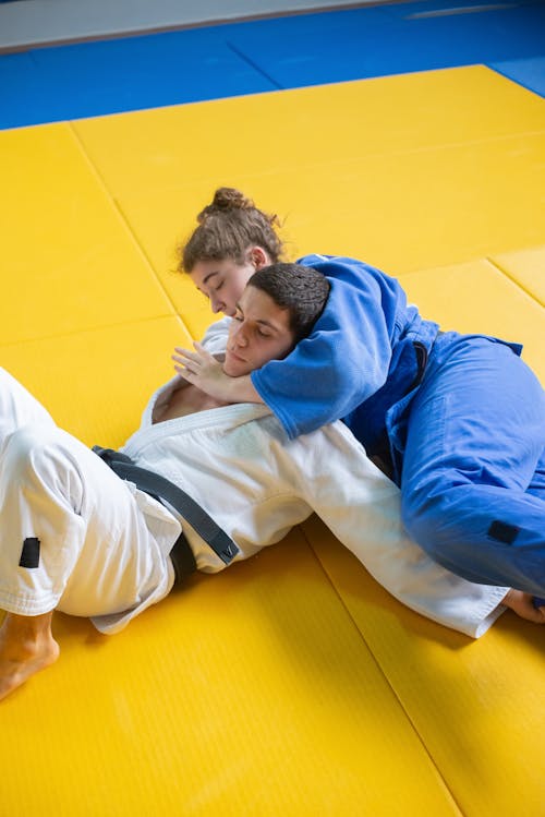 A Woman Performing a Grappling Hold