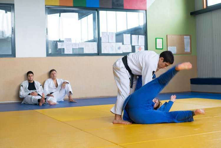 Man Doing Judo Training With A Woman