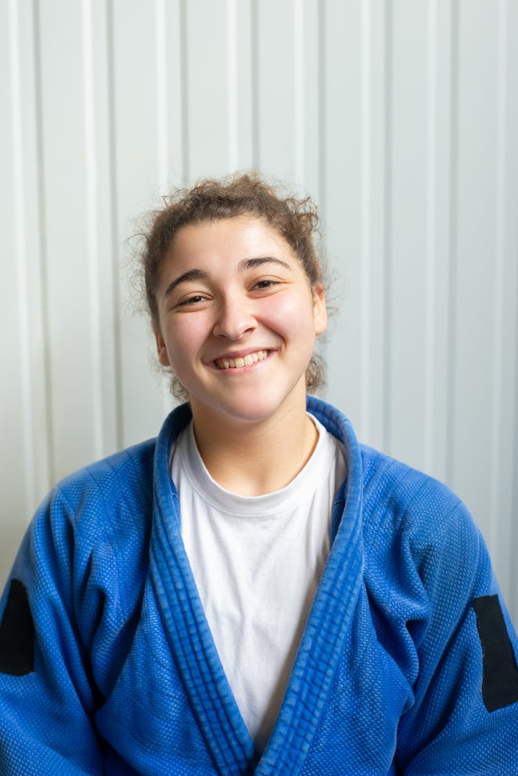 A Woman Wearing Blue Judo Uniform