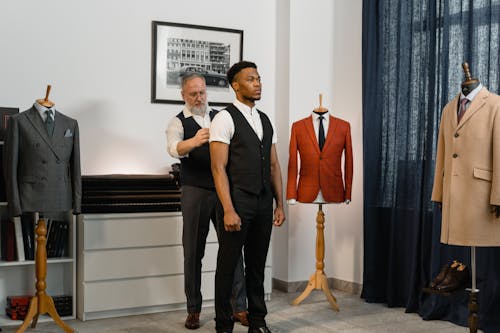 Tailor Man measuring the Man