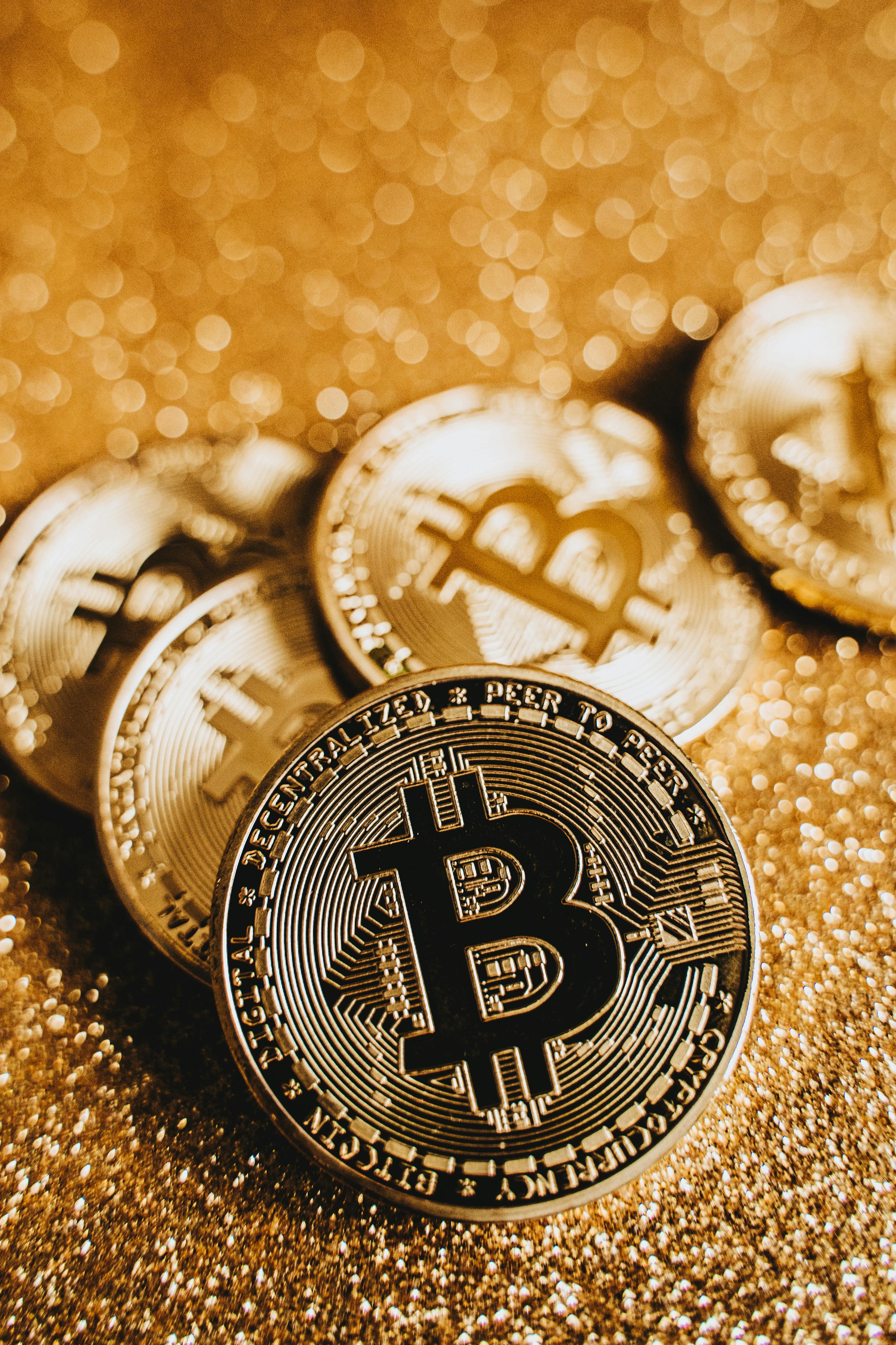 bitcoins on gold surface