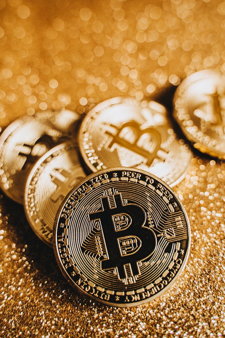 Bitcoins On Gold Surface