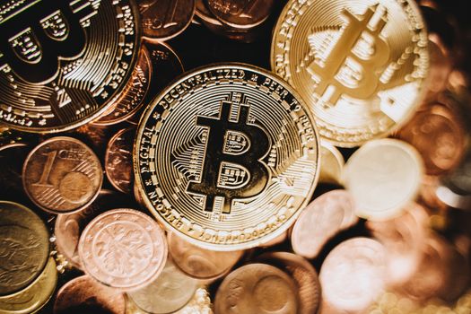 Detailed close-up of bitcoin and euro coins representing cryptocurrency and traditional money in Erfurt.
