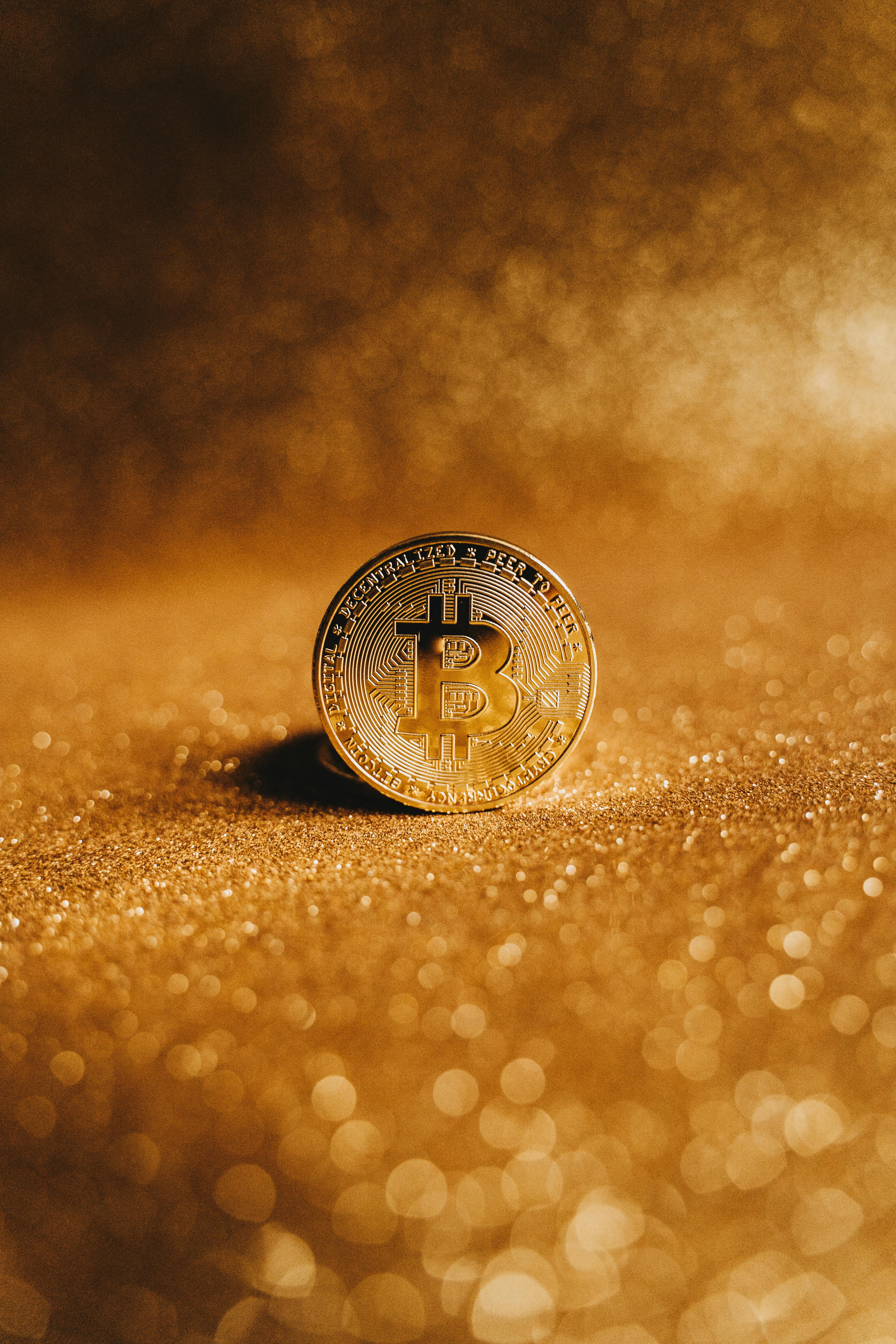 bitcoin on glittery surface
