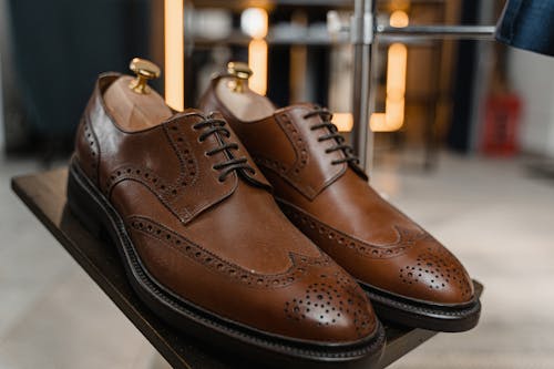 Close Up Photo of a Brown Leather Shoes