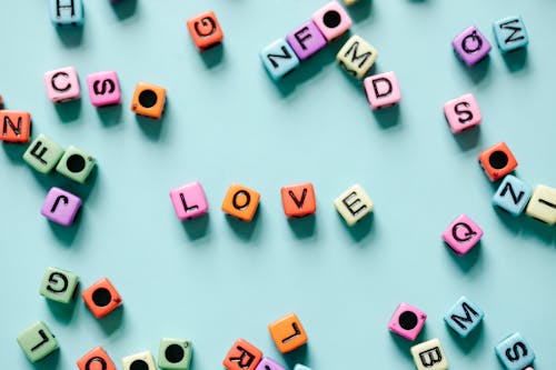 Free A Word Love Spelled on Letter Dice Stock Photo