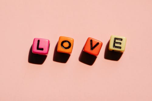 Free A Word Love Spelled with Letter Dice Stock Photo