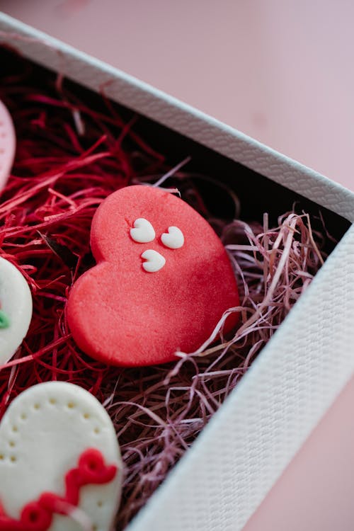 Free Colorful cookies in box during holiday celebration Stock Photo