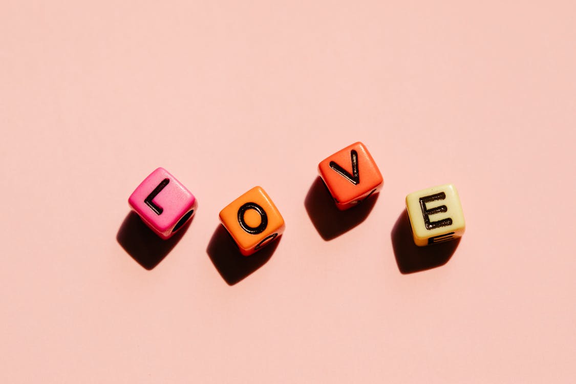 Free Colorful dice with Love inscription Stock Photo
