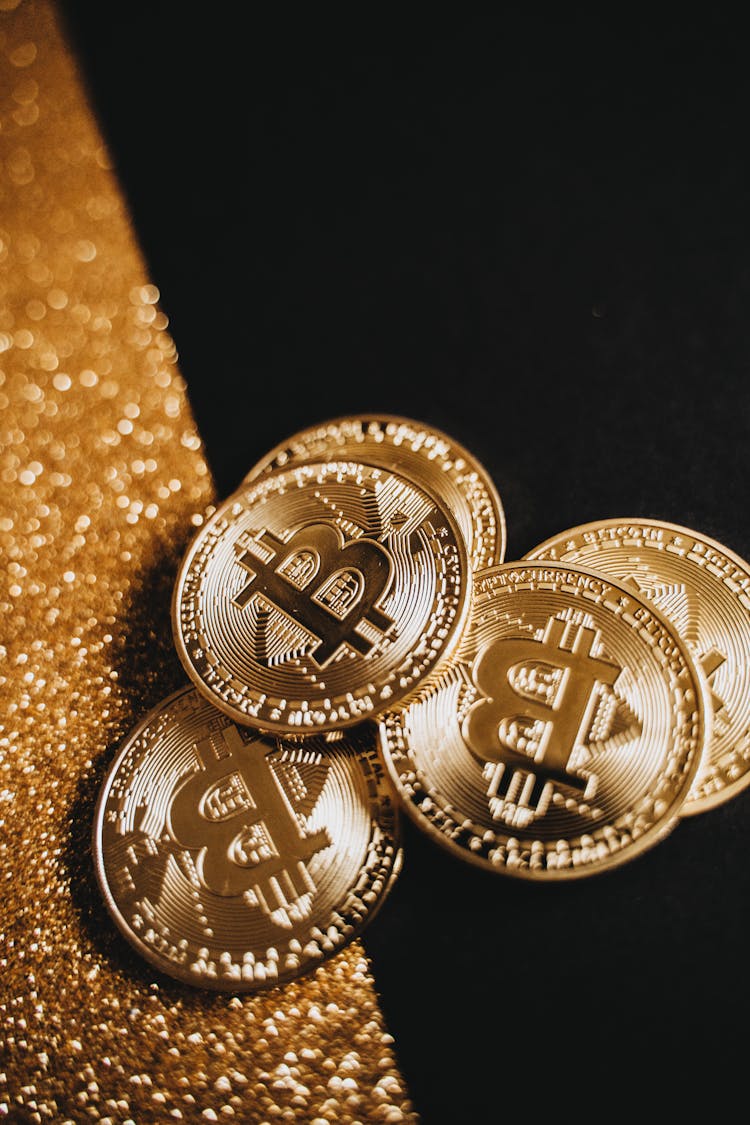 Close-up Photo Of Gold Round Coins