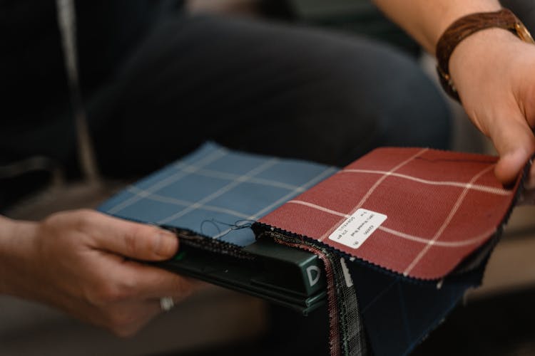 Person Holding Fabric Samples