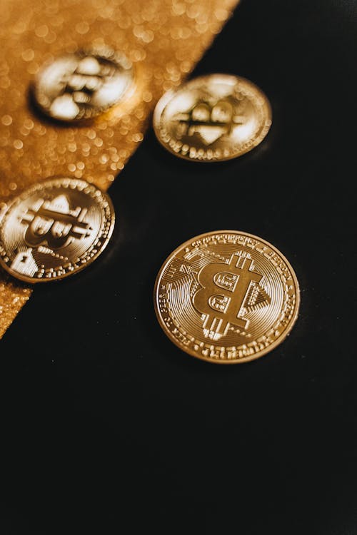 Free Close-Up Shot of Gold Coins  Stock Photo