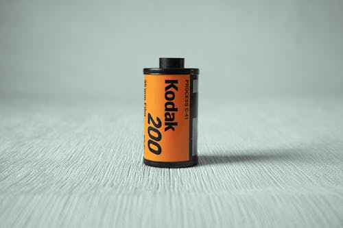 Gratis lagerfoto af appelsin, container, film