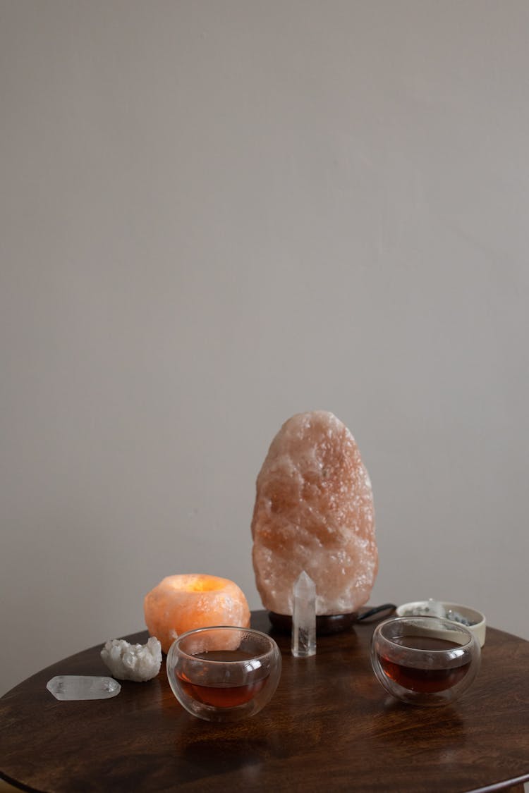 Crystals And Tea In Cups On A Table 