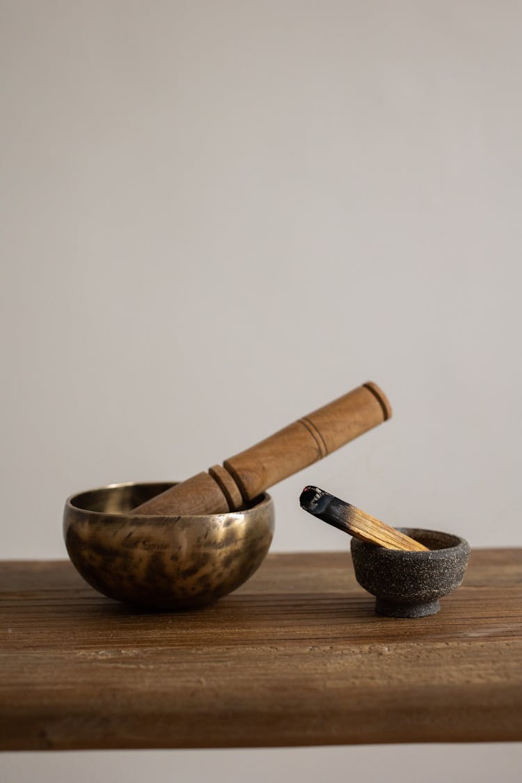 Close-up Of A Mortar And Palo Santo