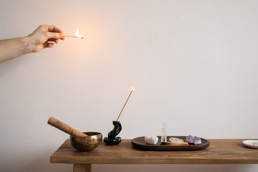 Burning Incense and Crystals on a Table