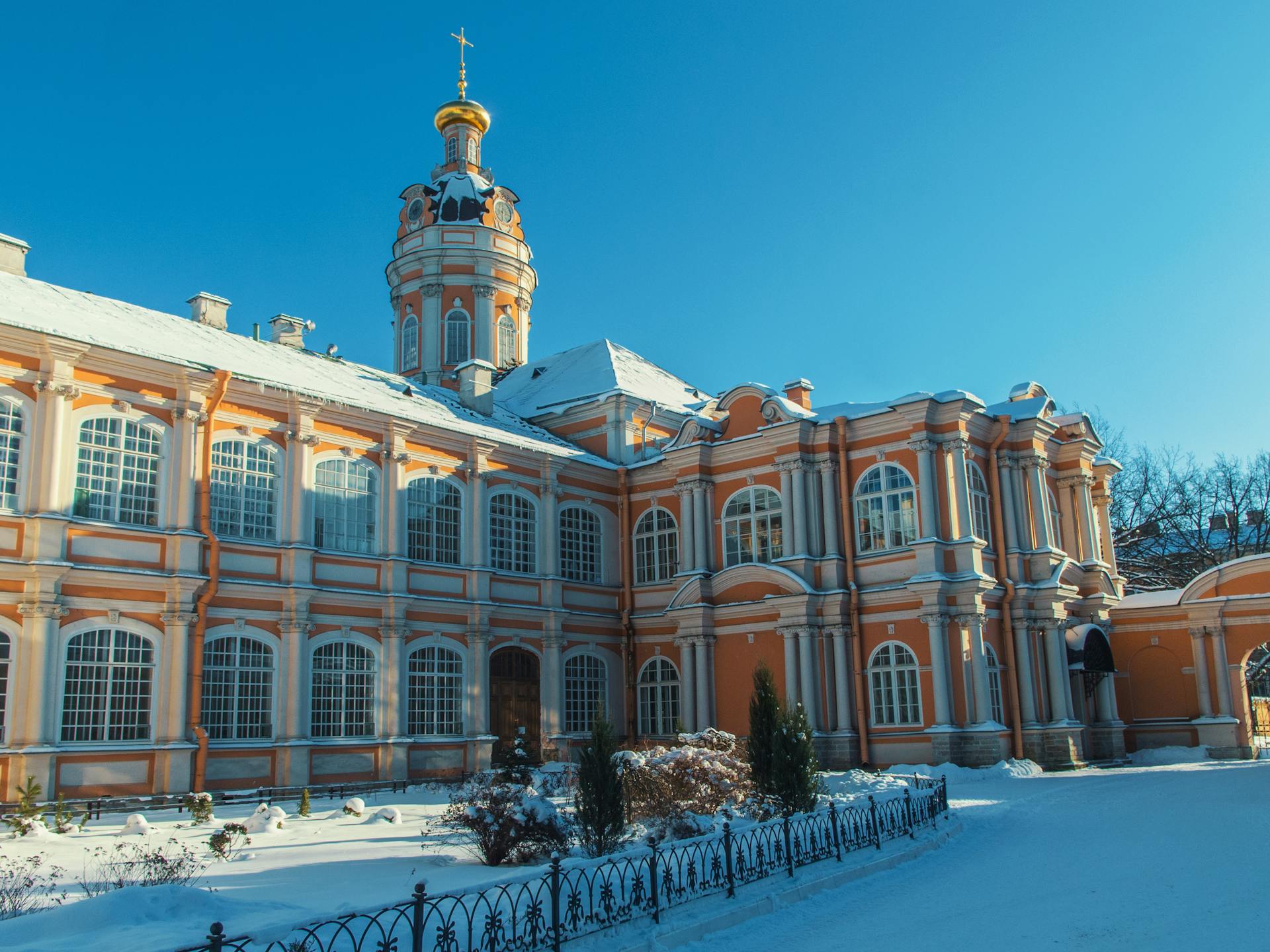 Snow-covered Alexander Nevsky Lavra in Saint Petersburg, showcasing architecture in winter.