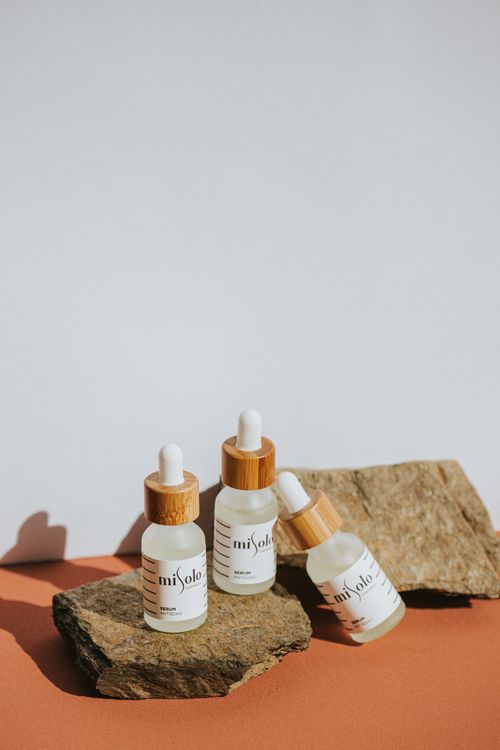 Free Elegant still life of skincare droppers and rocks with a minimalistic touch. Stock Photo