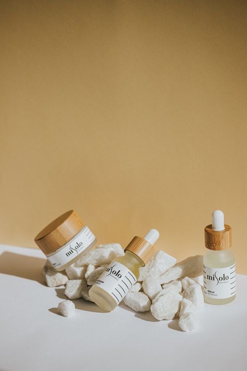 Free Elegant skin care products with natural stones on a minimalist background. Stock Photo