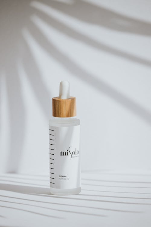A Beauty Product on a White Surface · Free Stock Photo
