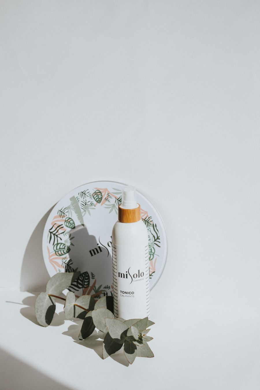 CLARO spray bottle formula shot with botanical accents