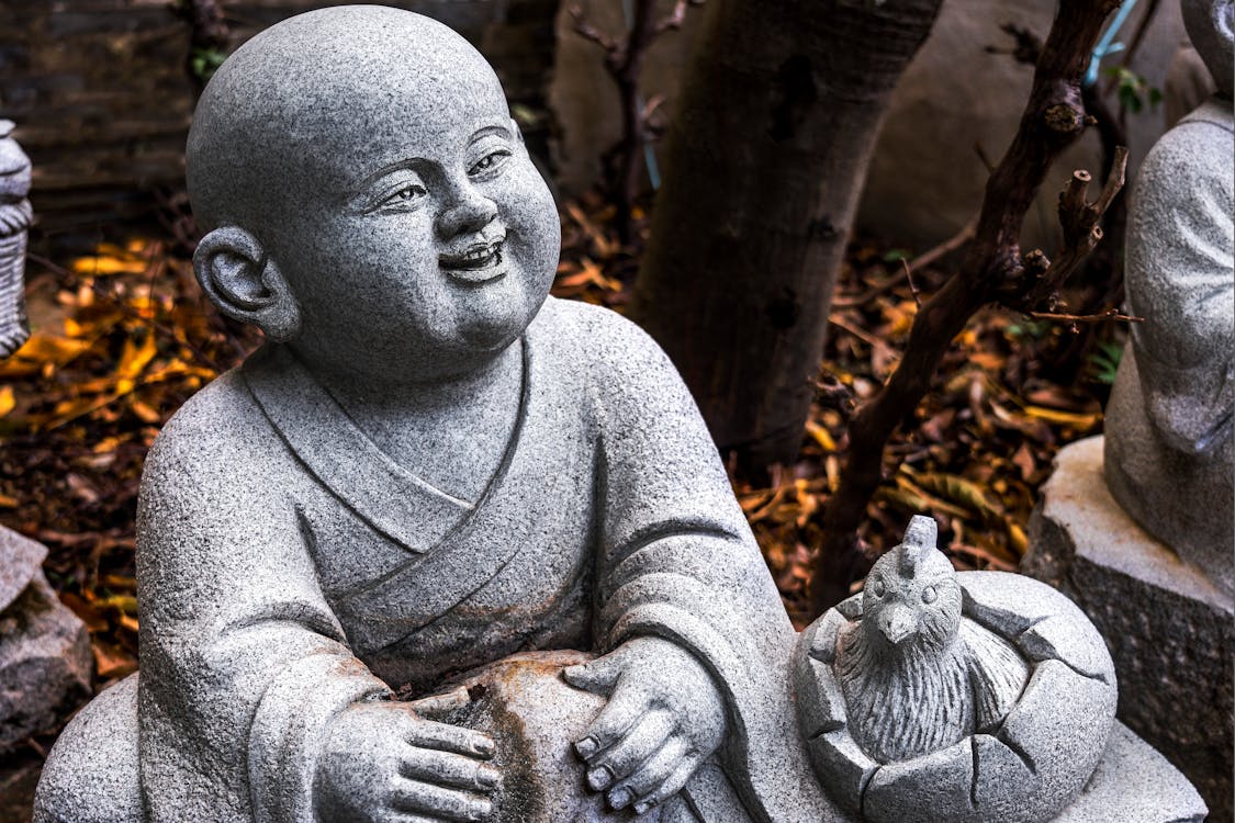 A Little Buddha in the Garden · Free Stock Photo