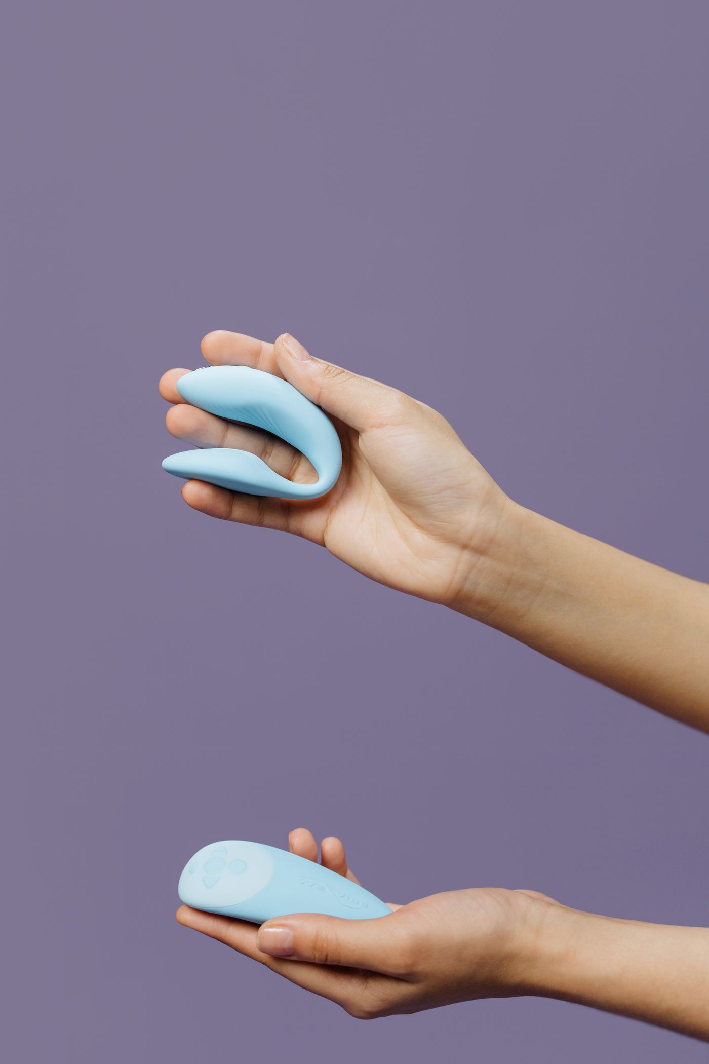Hands holding silicone wearable products